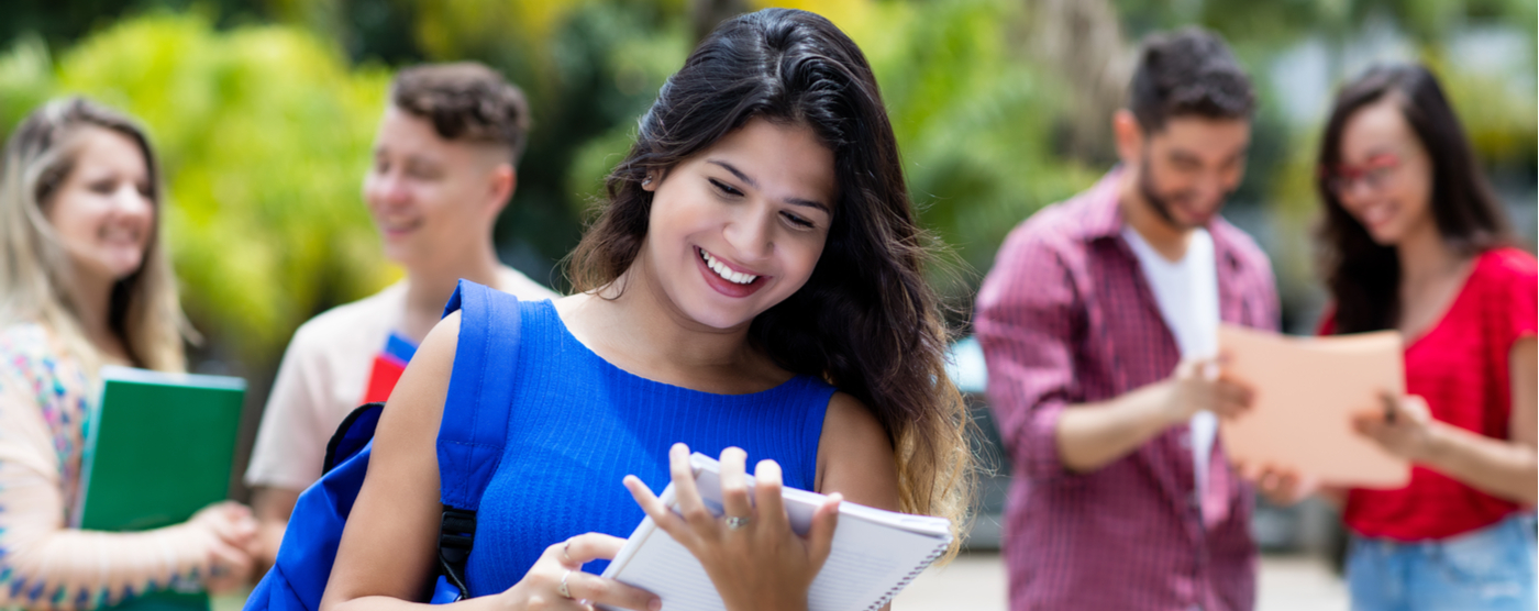 Female Mexican student receiving good news about college scholarship