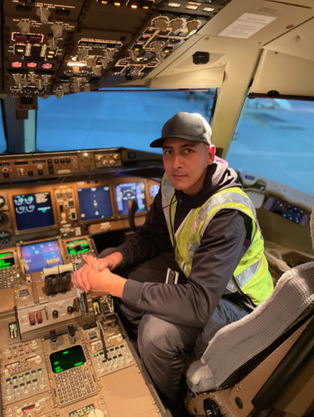 Mahdi Macbahi in cockpit of airplane