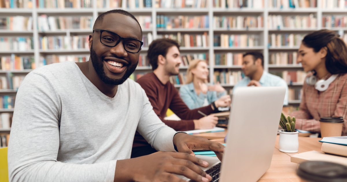 Student studying for finals in library