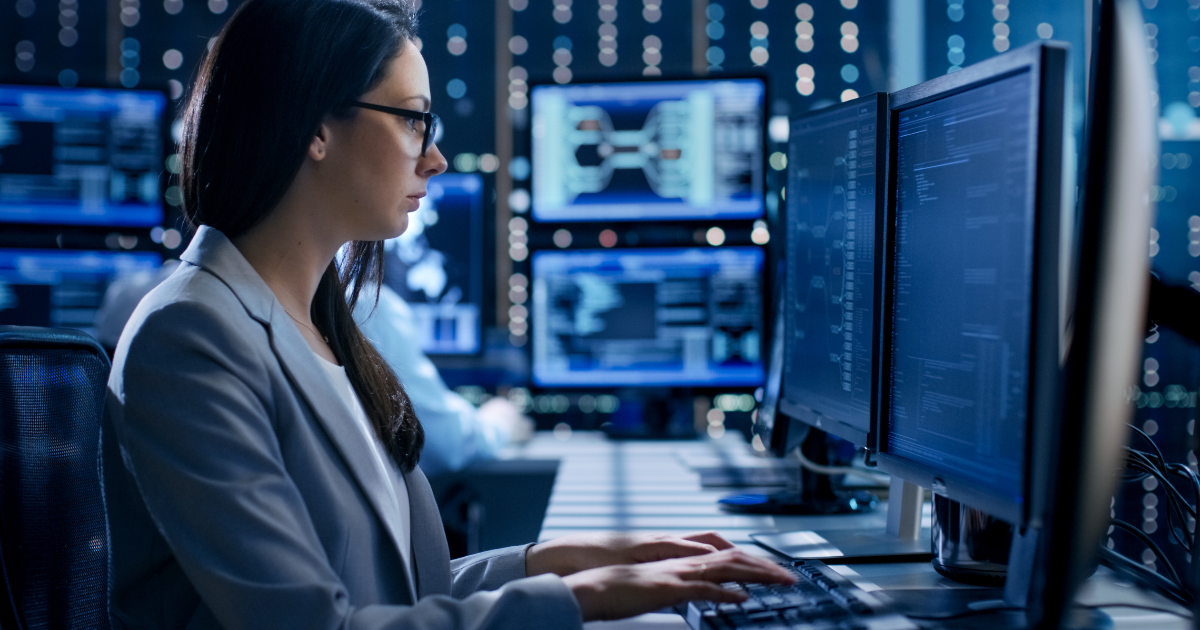 Cybersecurity engineer typing on computer